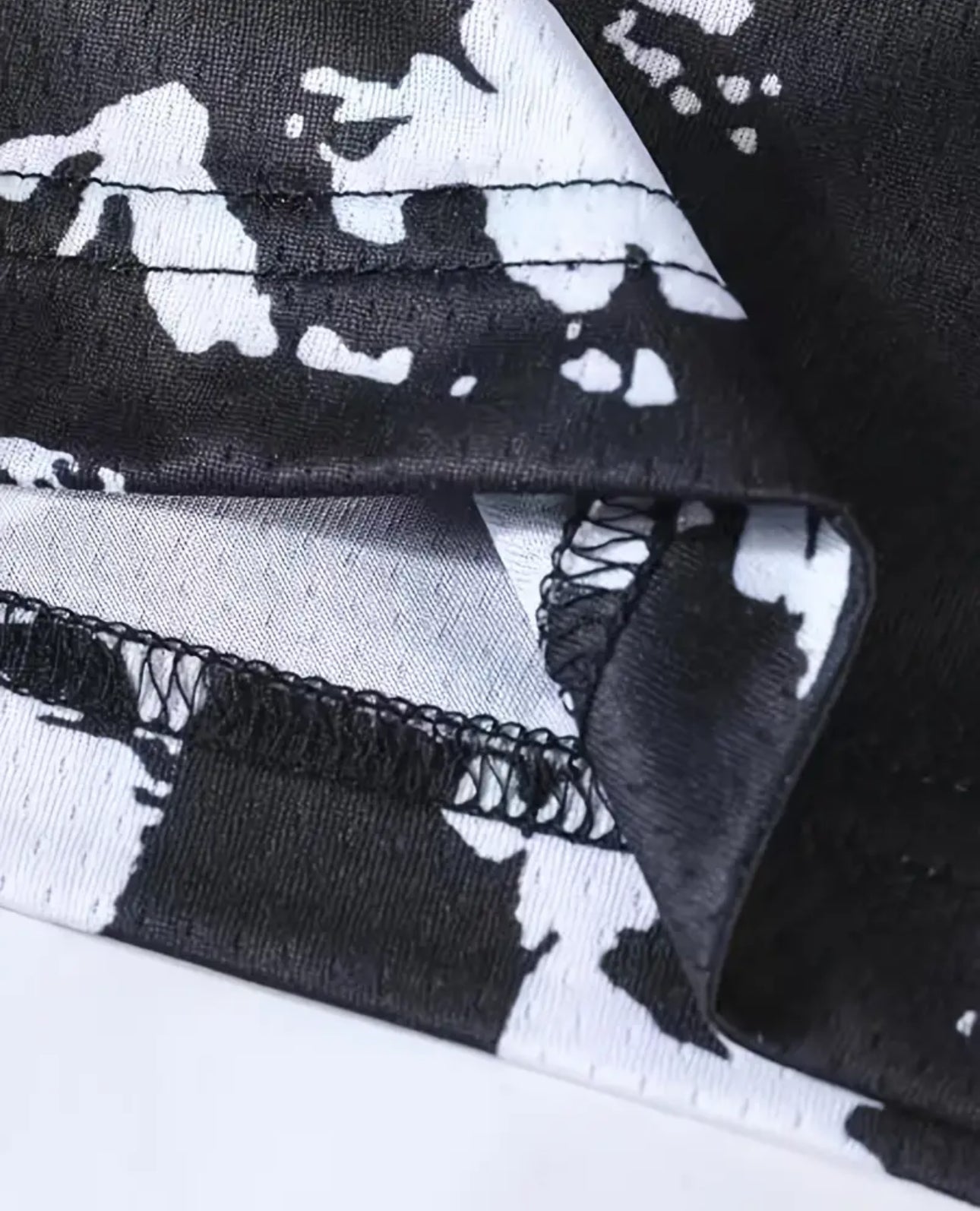 MESH GRAPHIC SHORTS